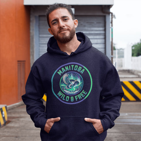 Embrace the magic of the prairies with our Manitoba – Wild & Free hoodie, featuring a captivating graphic of a snowy owl in flight beneath the shimmering northern lights.